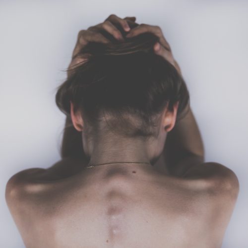 stocksnap-woman-2609115 What Causes Back Pain Between the Shoulder Blades