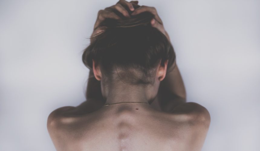 stocksnap-woman-2609115 What Causes Back Pain Between the Shoulder Blades